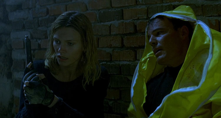 Adrenalin Fear the Rush 1996 Movie Scene Natasha Henstridge as Delon and Andrew Divoff as Sterns talking in the tunnel