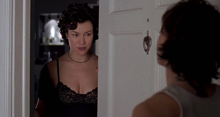 Bound 1996 Movie Scene Jennifer Tilly as Violet opening the door wearing a sexy nightgown