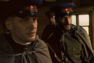 Child 44 Movie Scene Tom Hardy as Leo Demidov and Fares Fares as Alexei in their Soviet uniforms