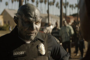 Bright 2017 Movie Scene Joel Edgerton as Nick Jakoby Orc police officer in the hood