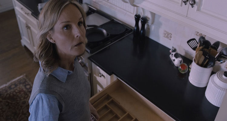 I See You 2019 Movie Scene Helen Hunt as Jackie hearing something strange inside the house