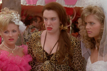 Muriels Wedding 1994 Movie Scene Toni Collette as Muriel wearing a leopard dress at Tania's wedding