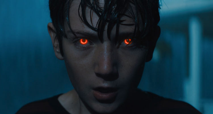 Brightburn 2019 Movie Scene Jackson A. Dunn as Brandon Breyer with his eyes glowing red