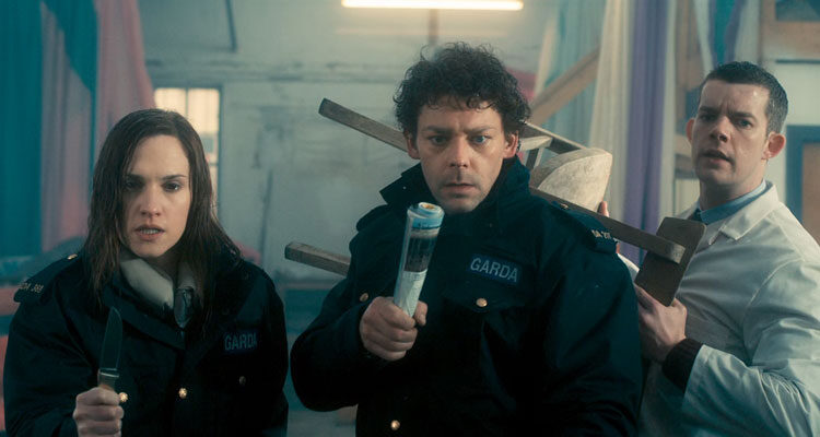 Grabbers 2012 Movie Scene Ruth Bradley as Lisa, Richard Coyle as Ciarán and Russell Tovey as Adam preparing to fight an alien monster