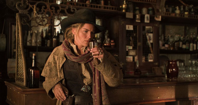 The Quick and the Dead 1995 Movie Scene Sharon Stone as Ellen drinking whiskey in a saloon