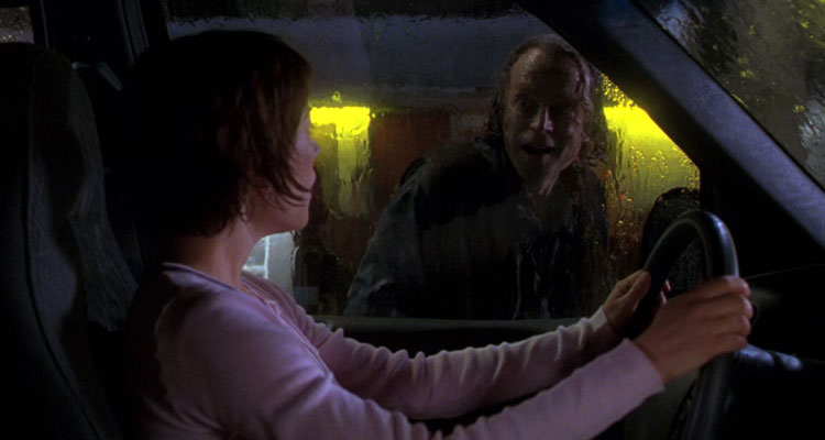 Urban Legend 1998 Movie Scene Natasha Gregson Wagner as Michelle Mancini talking to Brad Dourif as the gas station attendant