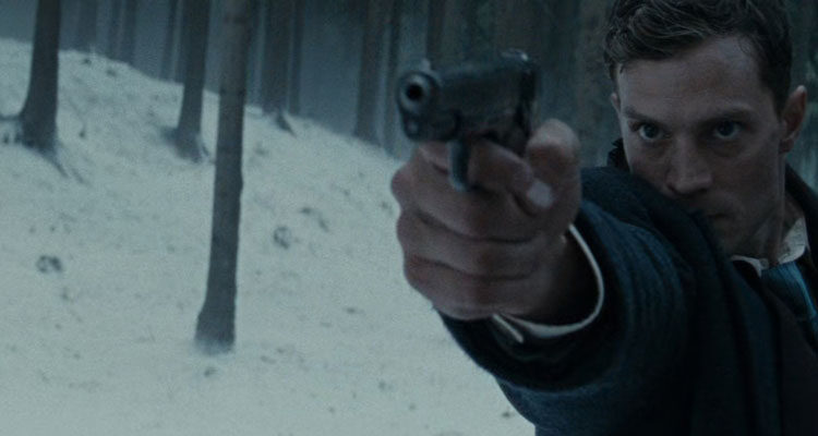 Anthropoid 2016 Movie Scene Jamie Dornan as Jan Kubis aiming his gun at the traitor in the forest outside of Prague