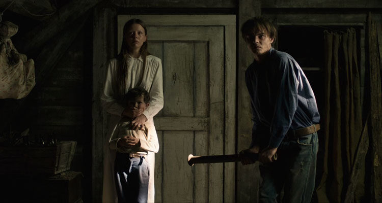 Marrowbone 2017 Movie Scene Charlie Heaton as Billy holding a pipe in the attic with Mia Goth as Jane and Matthew Stagg as Sam