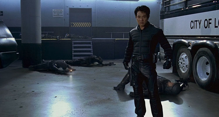 The One 2001 Movie Scene Jet Li as Gabriel Yulaw standing in the garage of the police station after he beat up the police officers
