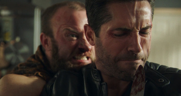 Accident Man 2018 Movie Scene Scott Adkins as Mike Fallon and Ross O'Hennessy as Carnage Cliff fighting