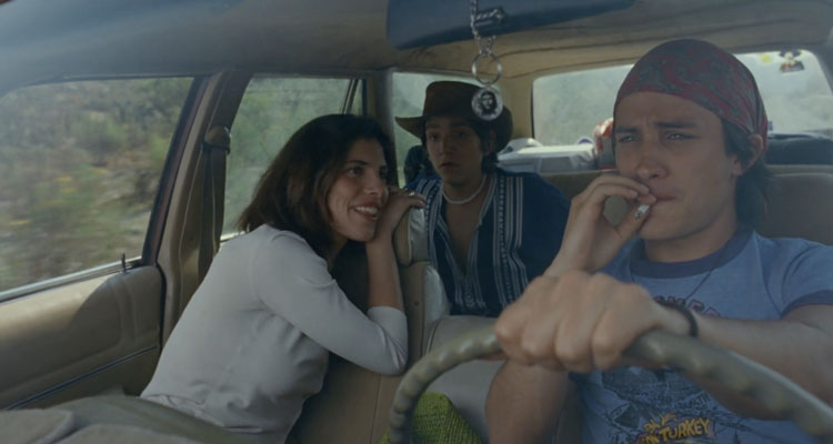 Y Tu Mama Tambien 2001 Movie Scene Gael García Bernal as Julio driving and smoking weed while Maribel Verdú as Luisa and Diego Luna as Tenoch are talking