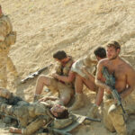 Kajaki Movie 2014 Scene Paratroopers guarding a wounded soldier in Afghanistan