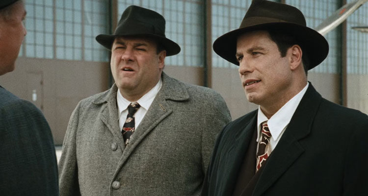 Lonely Hearts Movie 2006 Scene John Travolta as Elmer Robinson and James Gandolfini as Det. Charles Hilderbrandt talking to other police officers about the case