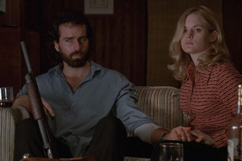 Rush 1991 Movie Scene Jason Patric as Jim Raynor and Jennifer Jason Leigh as Kristen holding out in their apartment