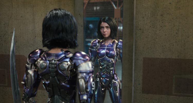 Alita Battle Angel 2019 Movie Scene Rosa Salazar as Alita wearing her purple armor and sword