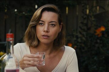 Emily The Criminal 2022 Movie Scene Aubrey Plaza as Emily drinking with her boyfriends mother