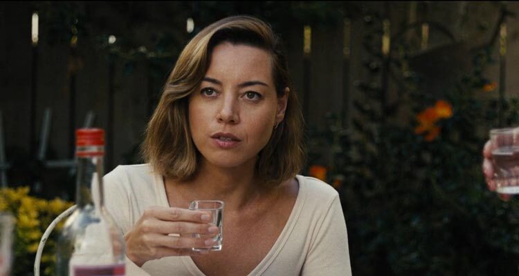 Emily The Criminal 2022 Movie Scene Aubrey Plaza as Emily drinking with her boyfriends mother