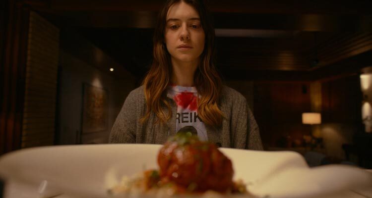 Fresh 2022 Movie Scene Daisy Edgar-Jones as Noa during dinner looking at spaghetti and meatballs
