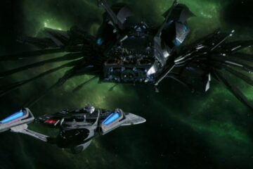 Star Trek Nemesis 2002 Movie Scene Starship Enterprise and Romulan Warbird Scimitar locked in mortal combat