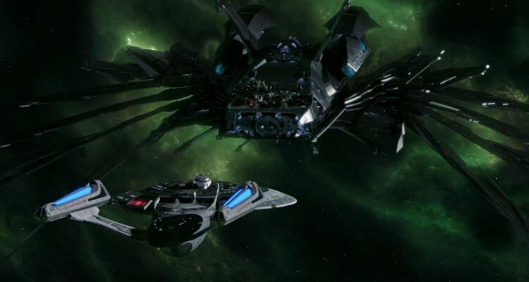 Star Trek Nemesis 2002 Movie Scene Starship Enterprise and Romulan Warbird Scimitar locked in mortal combat