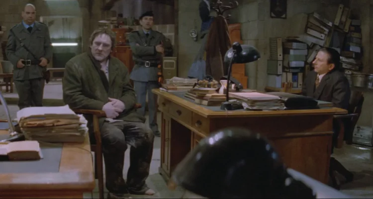 A Pure Formality 1994 Movie Scene Gerard Depardieu as Onoff being interrogated by Roman Polanski as Inspector in a police station in pouring rain