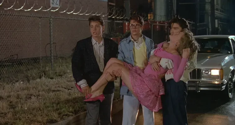 License To Drive 1988 Movie Scene Three teenagers holding a passed out girl while watching a drunk guy steal their car