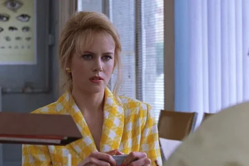 To Die For 1995 Movie Scene Nicole Kidman as Suzanne Stone in a bright yellow dress convincing her future boss to get her a job