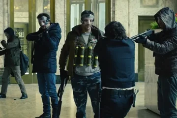 To Steal From A Thief 2016 Movie Scene Bank robbers showing their explosive vests to the security guard at the bank