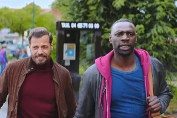 The Takedown 2022 Movie Scene Omar Sy as Ousmane Diakhité and Laurent Lafitte as François Monge