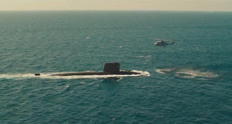 The Wolfs Call 2019 Movie Scene The submarine surfacing with the helicopter hovering over it