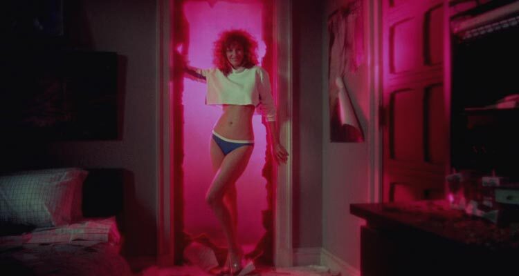 Weird Science 1985 Movie Scene Kelly LeBrock as Lisa appearing out of the closet wearing blue panties and crop top