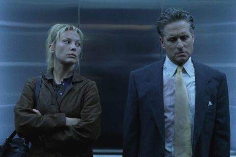The Game 1997 Movie Scene Michael Douglas as Nicholas Van Orton and Deborah Kara Unger as Christine in an elevator
