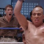 Kickboxer 1989 Movie Scene Michel Qissi as Tong Po breaking the back of Dennis Alexio as Eric with Jean-Claude Van Damme as Kurt screaming in the background