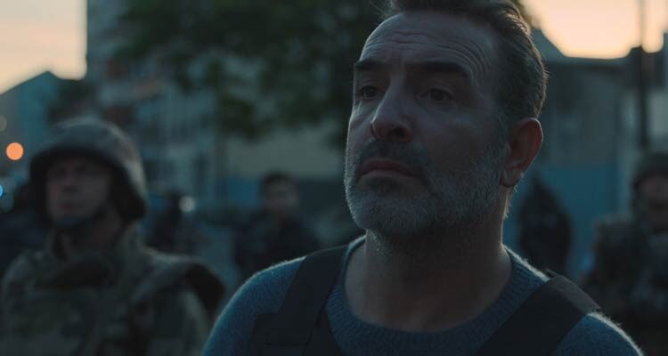 Novembre 2022 Movie Scene Jean Dujardin as Fred in front of the apartment where the terrorist are hiding