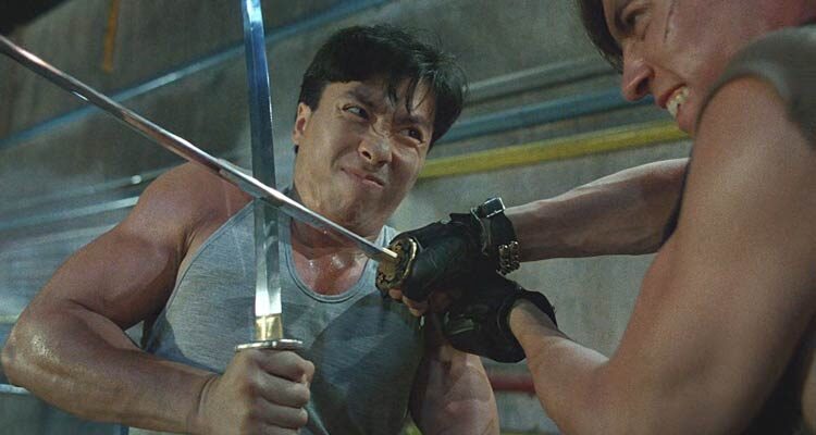 Tiger Cage 2 1990 Movie Scene Donnie Yen as Dragon Yau fighting with John Salvitti using samurai swords