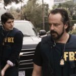 Unthinkable 2010 Movie Scene Gil Bellows as FBI Agent Vincent and Brandon Routh as FBI Agent D.J. Jackson about to enter a house armed