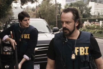 Unthinkable 2010 Movie Scene Gil Bellows as FBI Agent Vincent and Brandon Routh as FBI Agent D.J. Jackson about to enter a house armed