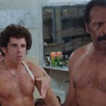 Starsky and Hutch 2004 Movie Scene Owen Wilson as Hutch and Ben Stiller as Starsky nude but wearing gun holsters in the bathroom with Fred Williamson as Captain Doby