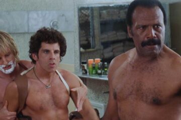 Starsky and Hutch 2004 Movie Scene Owen Wilson as Hutch and Ben Stiller as Starsky nude but wearing gun holsters in the bathroom with Fred Williamson as Captain Doby