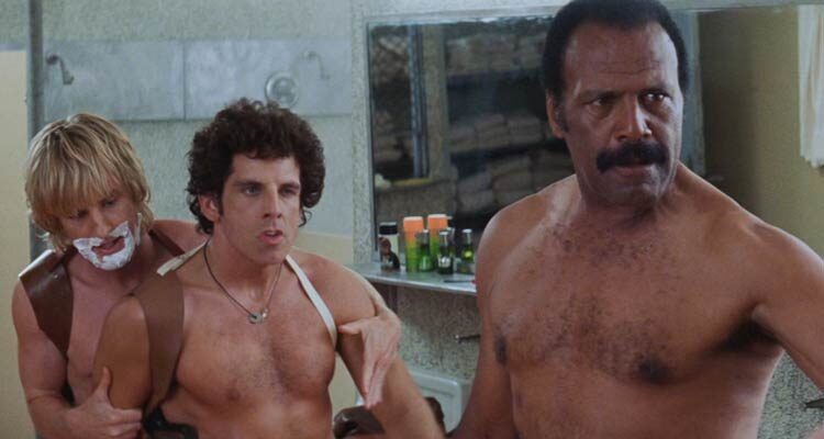 Starsky and Hutch 2004 Movie Scene Owen Wilson as Hutch and Ben Stiller as Starsky nude but wearing gun holsters in the bathroom with Fred Williamson as Captain Doby