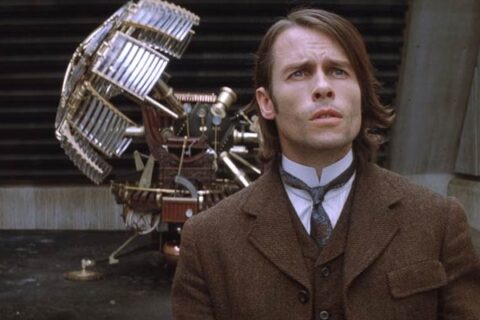 The Time Machine 2002 Movie Scene Guy Pearce as Alexander Hartdegen with the steampunk-looking time machine in the background seeing the future for the first time