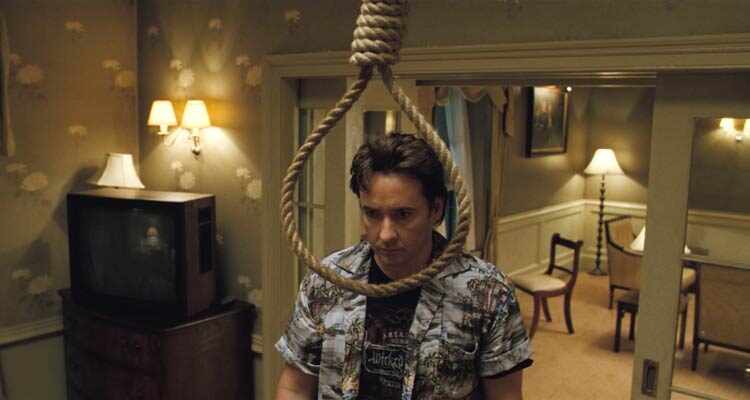 1408 Movie 2007 Scene John Cusack as Mike Enslin in the room 1408 of the Dolphin Hotel with a noose hanging in front of him