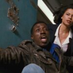 Passenger 57 1992 Movie Scene Wesley Snipes as John Cutter and Alex Datcher as Marti waiting to jump from the airplane
