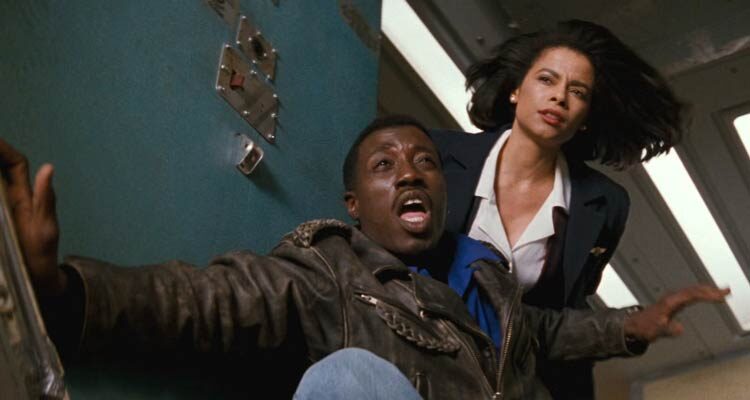 Passenger 57 1992 Movie Scene Wesley Snipes as John Cutter and Alex Datcher as Marti waiting to jump from the airplane