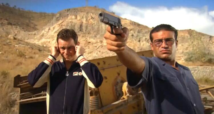 The Business 2005 Movie Scene Danny Dyer as Frankie and Tamer Hassan as Charlie practicing shooting in abandoned quarry in Spain