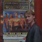 The Full Monty 1997 Movie Scene Robert Carlyle as Gaz looking at the poster for a male stripping group