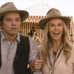 A Million Ways to Die in the West 2014 Movie Scene Seth MacFarlane as Albert and Charlize Theron as Anna at the town's fair