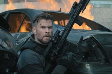 Extraction 2 2023 Movie Scene Chris Hemsworth as Tyler Rake reloading his gun