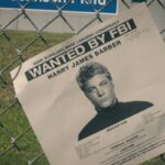 Finding Steve McQueen 2019 Movie Scene A wanted FBI flyer with the face of Travis Fimmel as Harry Barber