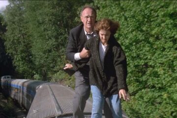 Narrow Margin 1990 Movie Scene Gene Hackman as Robert Caulfield and Anne Archer as Carol on top of the train trying to run from the bad guys